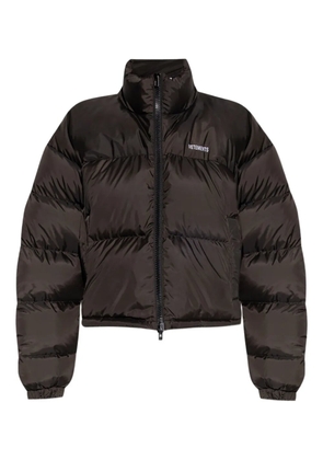 VETEMENTS logo-embroidered puffer jacket - Black