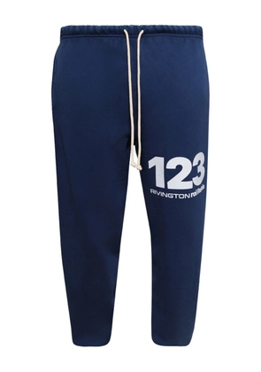 RRR123 drawstring graphic-print trousers - Blue