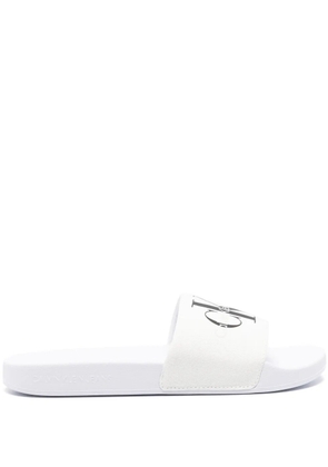 Calvin Klein Jeans logo-print canvas slides - White