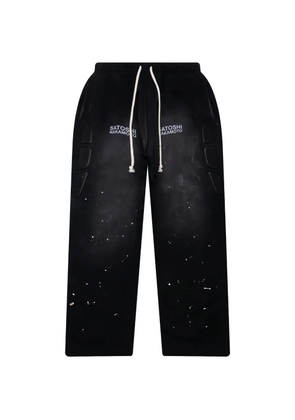 SATOSHI NAKAMOTO padded-detail sweatpants - Black