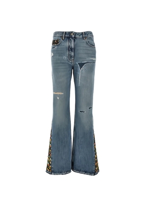 Valentino Garavani floral-embroidered ripped jeans - Blue