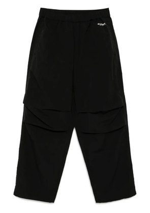 CHOCOOLATE logo-print trousers - Black