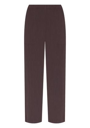 Issey Miyake Hatching Pleats trousers - Brown