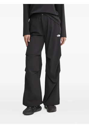 The North Face logo-print trousers - Black
