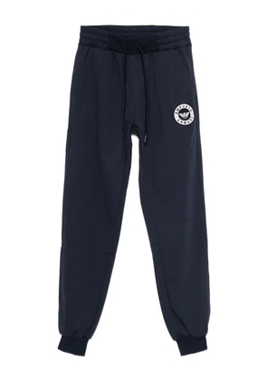 Emporio Armani logo-patch trousers - Blue