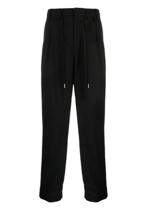 sacai drawstring-fastening tapered trousers - Black