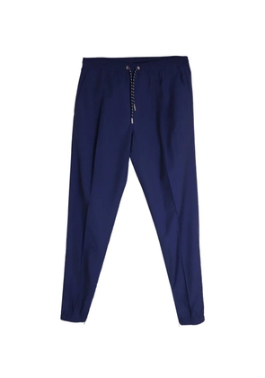 Christian Dior Pre-Owned wool drawstring trousers - Blue
