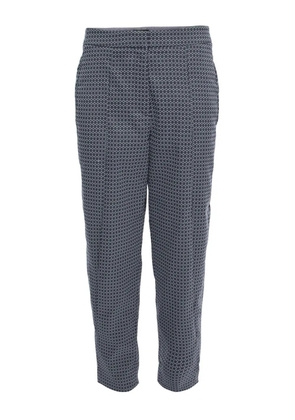 Giorgio Armani Pre-Owned geometric-print trousers - Grey