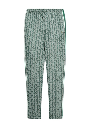 Lacoste geometric-pattern side-stripe trousers - Green