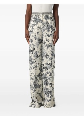 SIMONA CORSELLINI floral-print trousers - Neutrals