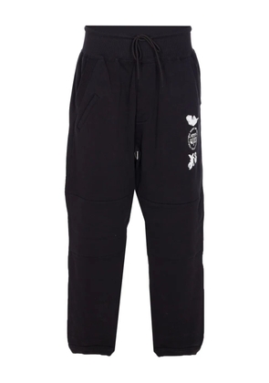 Y-3 graphic-logo cuffed trousers - BLACK