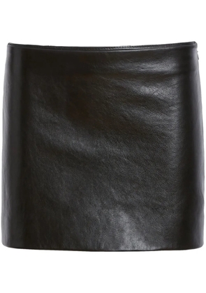 KHAITE The Jett leather miniskirt - Black