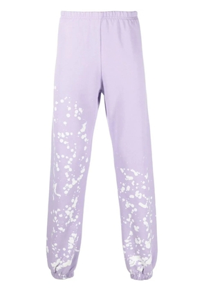 Liberal Youth Ministry paint print track pants - Purple