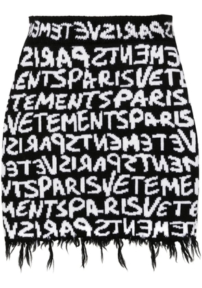 VETEMENTS monogram-jacquard merino miniskirt - Black