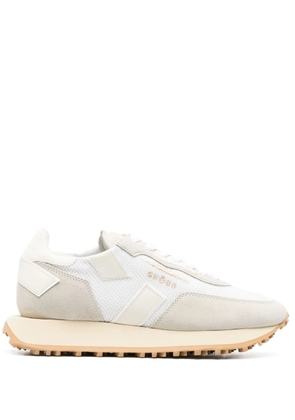 GHŌUD logo-embossed low-top sneakers - White