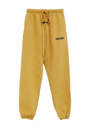 FEAR OF GOD ESSENTIALS drawstring logo-print track pants - Yellow