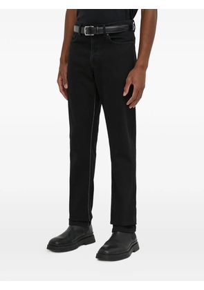 IRO stitched logo-detail jeans - Black