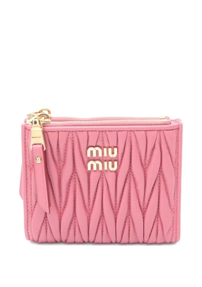 Miu Miu Pre-Owned 2020s matelassé logo bi-fold wallet - Pink