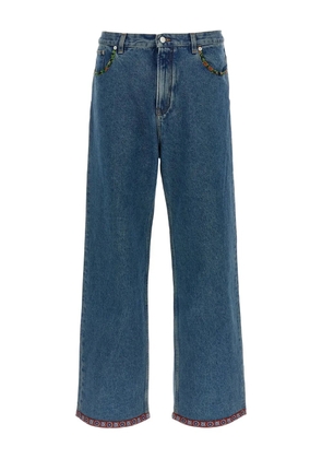 Valentino Garavani floral-insert jeans - Blue