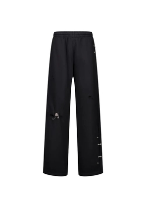 We11done piercing-detail track pants - Black