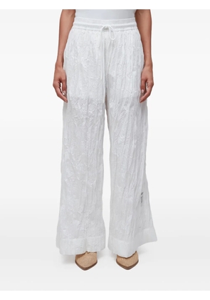 Osklen wrinkle straight-leg trousers - White