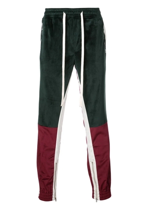 God's Masterful Children Varsity track pants - Green