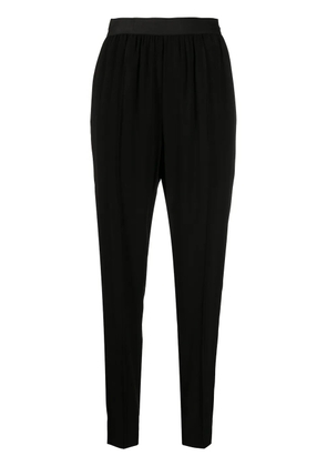 Maison Margiela elasticated waistband tapered trousers - Black
