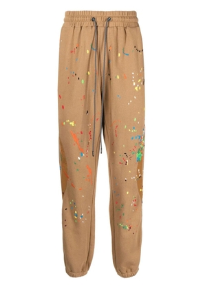 Mostly Heard Rarely Seen Warped paint-embroidered track pants - Brown