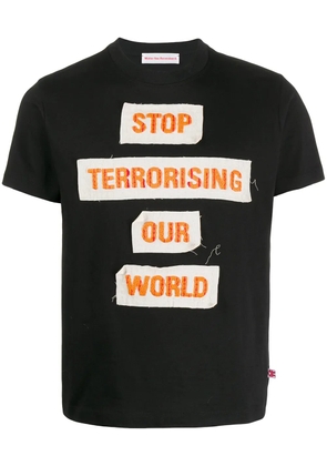 Walter Van Beirendonck Pre-Owned 2015 Stop Terrorising Our World patch T-shirt - Black