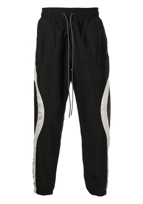 Mostly Heard Rarely Seen wave stripe-print track pants - Black