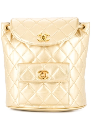 CHANEL Pre-Owned 1991-1994 quilted CC chain backpack - Metallic