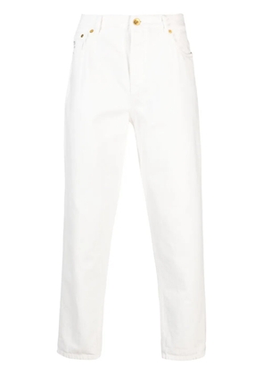 Brunello Cucinelli logo-embroidered tapered cotton jeans - White