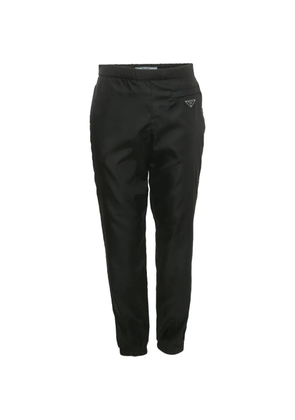 Prada Pre-Owned triangle-logo trousers - Black