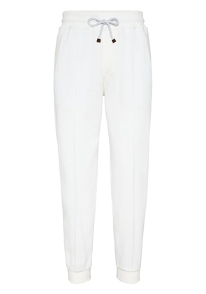 Brunello Cucinelli tapered cotton track pants - White