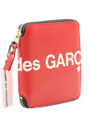 Comme Des Garçons logo-print round zipper wallet - Red