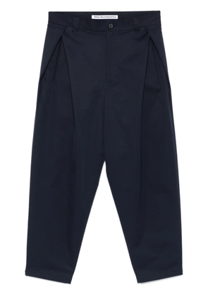 White Mountaineering tapered trousers - Blue