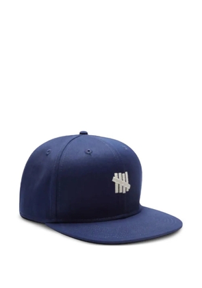 Undefeated contrast-logo snapback cap - Blue