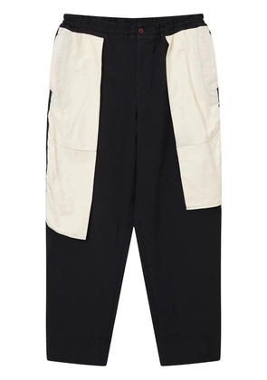 Black Comme Des Garçons panel-construction trousers