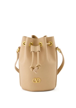 Valentino Garavani VLogo Signature drawstring bucket bag - Neutrals