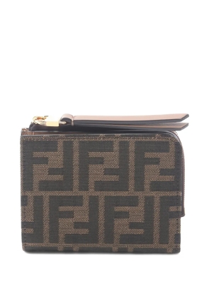 Fendi Pre-Owned 2020s Zucca bi-fold zip-fastening wallet - Brown