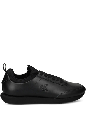 Calvin Klein logo-embossed leather sneakers - Black