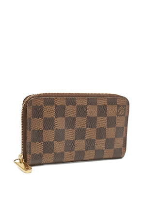 Louis Vuitton Pre-Owned 2010 Damier Ebene zip-around wallet - Brown