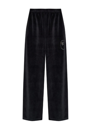 A BATHING APE® rhinestone-embellished trousers - Black