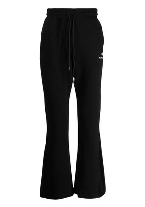 Mauna Kea flared logo-print track pants - Black