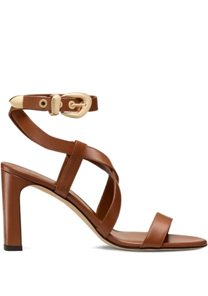 Stuart Weitzman buckle-embellished crossover sandals - Brown