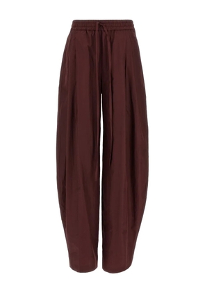 THE ANDAMANE pleated tapered trousers