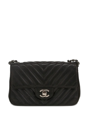 CHANEL Pre-Owned 2018 mini Timeless quilted logo shoulder bag - Black