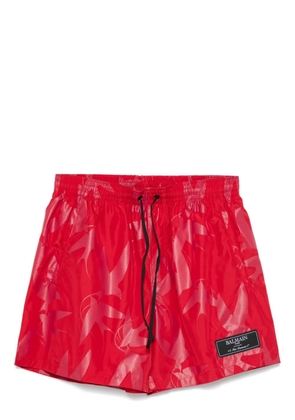 Balmain swallow-print swim shorts - Red