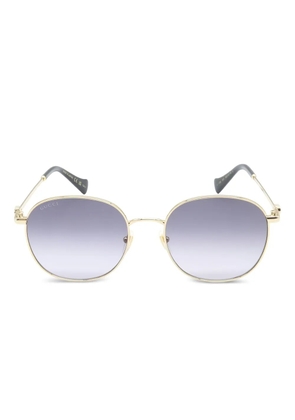 Gucci Pre-Owned 2020s round frame logo sunglasses - Gold