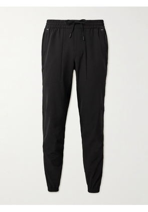Lululemon - License to Train Slim-Fit Tapered Stretch Recycled-Shell Track Pants - Men - Black - S